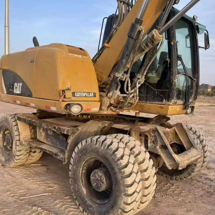 Used Digger Cat 315 Construction Machinery Construction Digger Used Cat 315 Cheap Excavator - Bager točkaš: slika 1 Used Digger Cat 315 Construction Machinery Construction Digger Used Cat 315 Cheap Excavator - Bager točkaš: slika 1