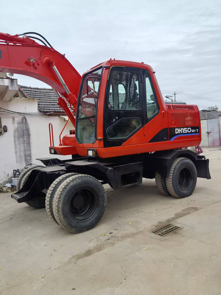 Doosan Used DH150W-7 wheeled excavator for sale at a low price. - Bager točkaš: slika 1 Doosan Used DH150W-7 wheeled excavator for sale at a low price. - Bager točkaš: slika 1