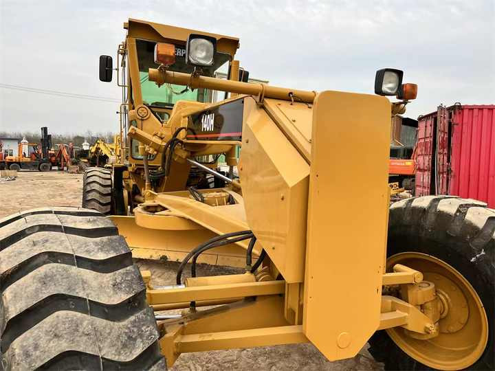 Used Caterpillar CAT 140H Land Road Motor Grader CAT140 CAT140H Used Grader Cheap Price for Sale - Grejder: slika 4 Used Caterpillar CAT 140H Land Road Motor Grader CAT140 CAT140H Used Grader Cheap Price for Sale - Grejder: slika 4