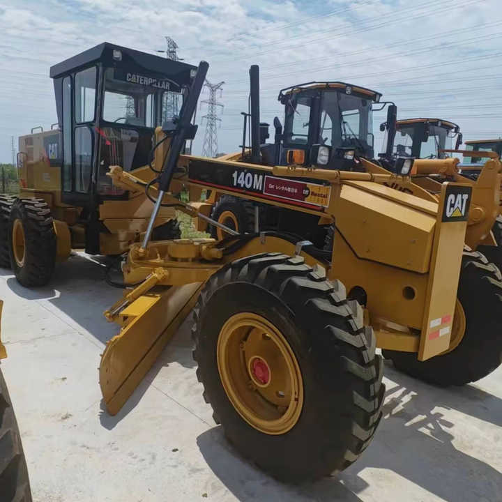 Used Japan Imported Caterpillar 140M Cat 140m Motor Grader with Good Quality and Low Price for Sale - Bager guseničar: slika 1 Used Japan Imported Caterpillar 140M Cat 140m Motor Grader with Good Quality and Low Price for Sale - Bager guseničar: slika 1
