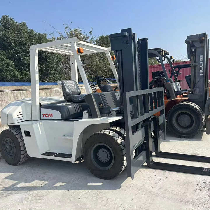 High Quality TCM 7 Ton with Hydraulic Distance Adjustment Used Forklift in Stock Used tcm Forklift 7 Ton Used tcm Fd70 Forklift - Viljuškar: slika 1 High Quality TCM 7 Ton with Hydraulic Distance Adjustment Used Forklift in Stock Used tcm Forklift 7 Ton Used tcm Fd70 Forklift - Viljuškar: slika 1