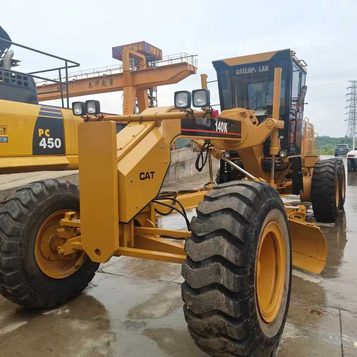 Used Cat 140K New Model Grader Popular Brand Japan Cat Hydraulic Machinery Construction Equipment - Grejder: slika 1 Used Cat 140K New Model Grader Popular Brand Japan Cat Hydraulic Machinery Construction Equipment - Grejder: slika 1