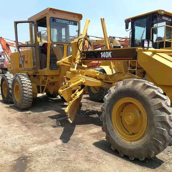 Used Caterpillar CAT 140k Land Road Motor Grader CAT140k Used Grader Cheap Price for Sale - Grejder: slika 1 Used Caterpillar CAT 140k Land Road Motor Grader CAT140k Used Grader Cheap Price for Sale - Grejder: slika 1