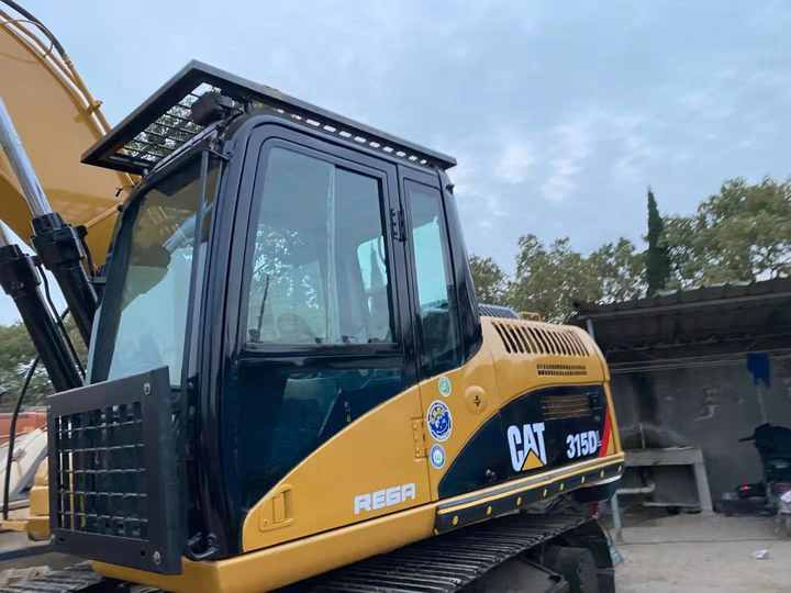 Used Crawler Caterpillar 315DL Excavator with Good Performance Hot Sale Used Engineering & Construction Machinery - Bager: slika 3 Used Crawler Caterpillar 315DL Excavator with Good Performance Hot Sale Used Engineering & Construction Machinery - Bager: slika 3