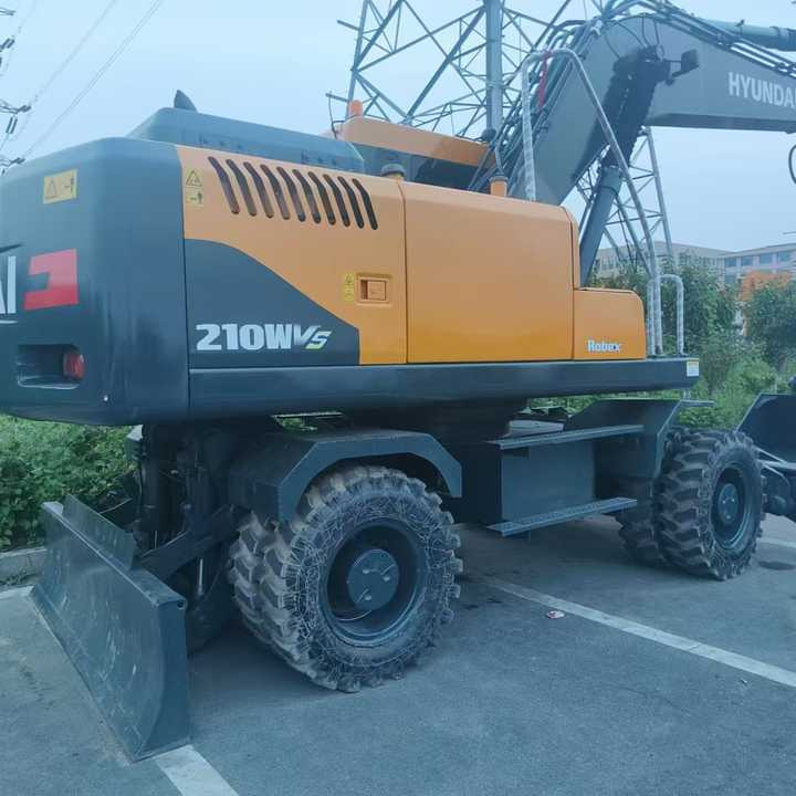 Used Hyundai 210w 20T Second Hand Korea Original Large Wheel Excavator Mining Construction Excavators Hot Sale 210w 220 225 30t - Bager: slika 1 Used Hyundai 210w 20T Second Hand Korea Original Large Wheel Excavator Mining Construction Excavators Hot Sale 210w 220 225 30t - Bager: slika 1