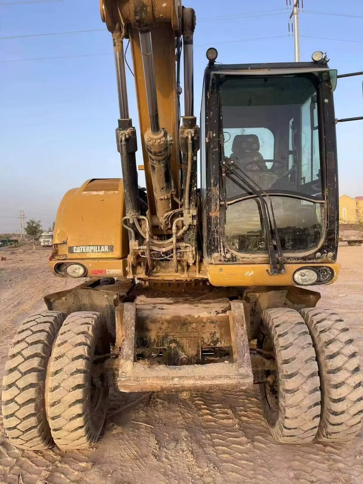 CATERPILLAR M315 - Bager točkaš: slika 3 CATERPILLAR M315 - Bager točkaš: slika 3