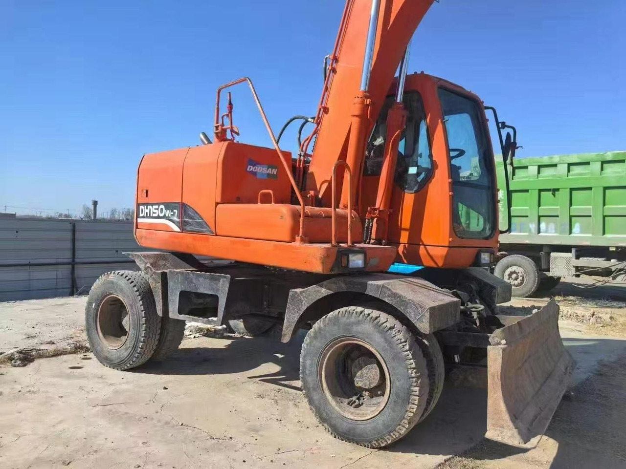 DOOSAN DH150W-7 - Bager točkaš: slika 1 DOOSAN DH150W-7 - Bager točkaš: slika 1