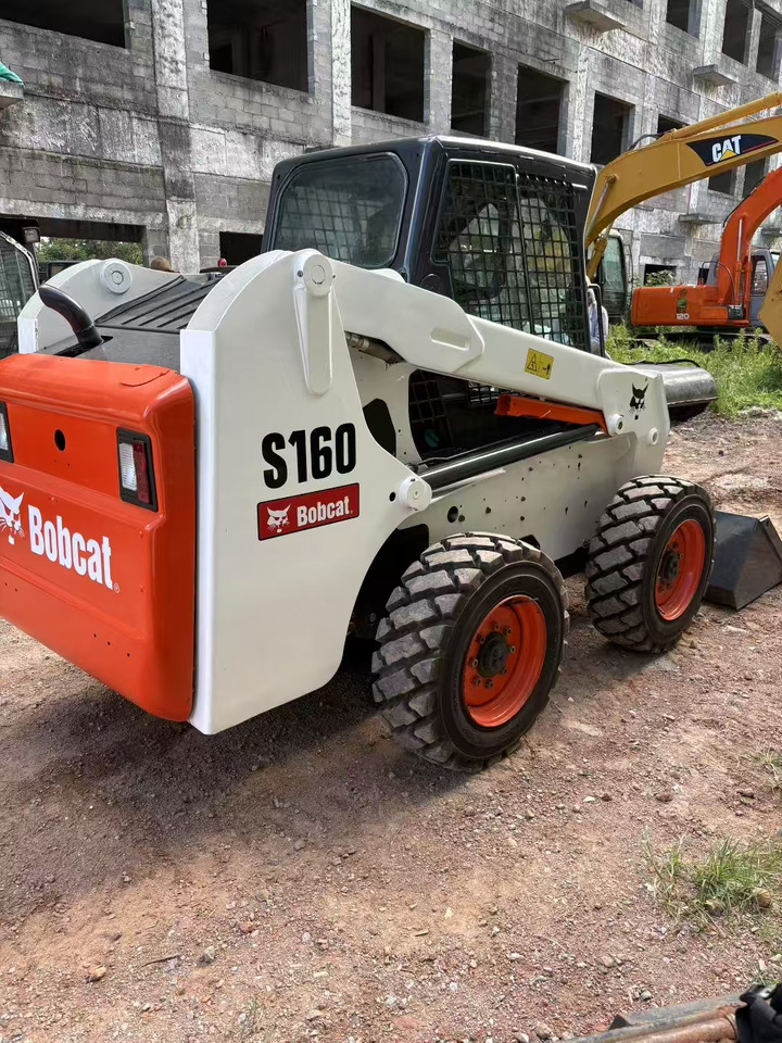BOBCAT S180 - Mini utovarivač: slika 1 BOBCAT S180 - Mini utovarivač: slika 1