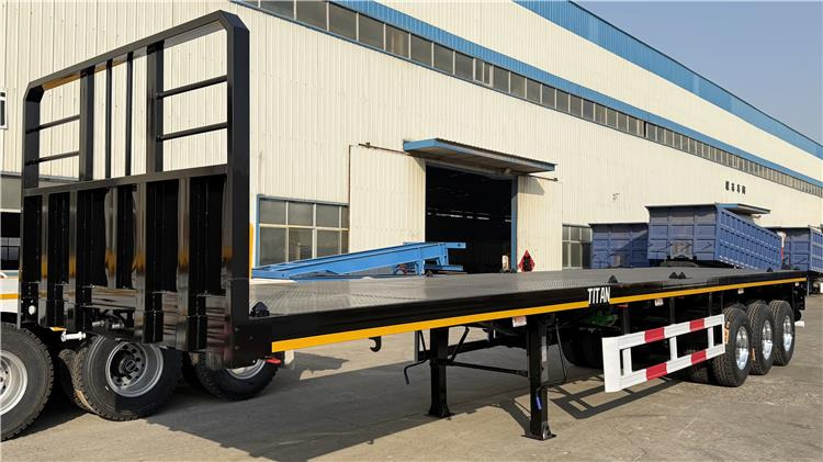 TITAN 12.5M 3 Axle Flat Deck Trailer for Sale In Tanzania - Poluprikolica za prevoz kontejnera/ Poluprikolica sa promenjivim sandukom: slika 2 TITAN 12.5M 3 Axle Flat Deck Trailer for Sale In Tanzania - Poluprikolica za prevoz kontejnera/ Poluprikolica sa promenjivim sandukom: slika 2