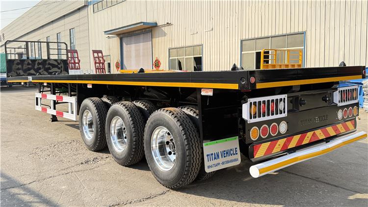 TITAN 12.5M 3 Axle Flat Deck Trailer for Sale In Tanzania - Poluprikolica za prevoz kontejnera/ Poluprikolica sa promenjivim sandukom: slika 5 TITAN 12.5M 3 Axle Flat Deck Trailer for Sale In Tanzania - Poluprikolica za prevoz kontejnera/ Poluprikolica sa promenjivim sandukom: slika 5