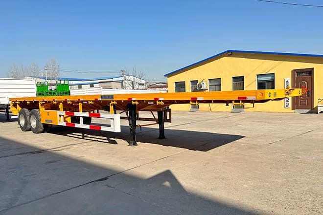 TITAN 2 Axle 40 Ft Flatbed Trailer for Sale in Uganda - Plato poluprikolica: slika 2 TITAN 2 Axle 40 Ft Flatbed Trailer for Sale in Uganda - Plato poluprikolica: slika 2