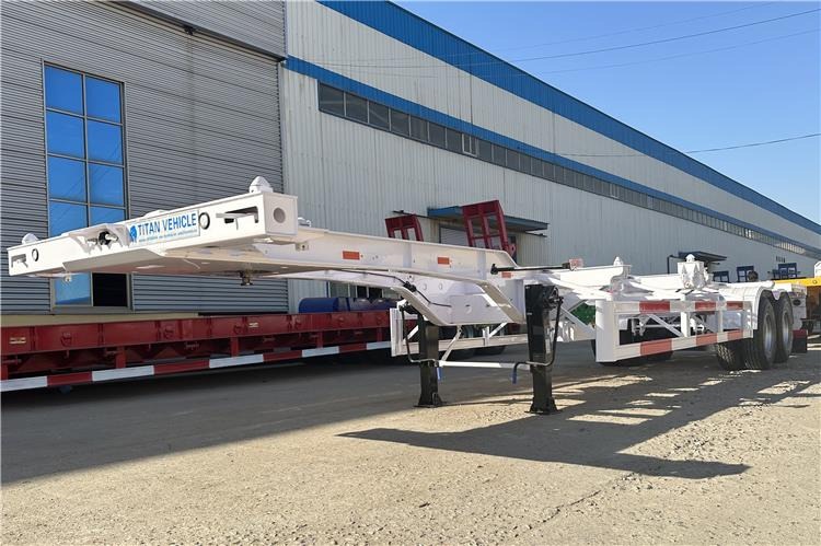 TITAN 2 Axle 40ft Container Transport Trailer for Sale In Nigeria - Poluprikolica sa golom šasijom: slika 2 TITAN 2 Axle 40ft Container Transport Trailer for Sale In Nigeria - Poluprikolica sa golom šasijom: slika 2