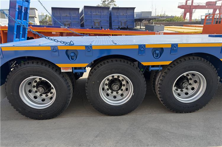 TITAN 3 Axle 80 Ton Low Bed Trailer Price for Sale In Nigeria - Niska poluprikolica za prevoz: slika 2 TITAN 3 Axle 80 Ton Low Bed Trailer Price for Sale In Nigeria - Niska poluprikolica za prevoz: slika 2