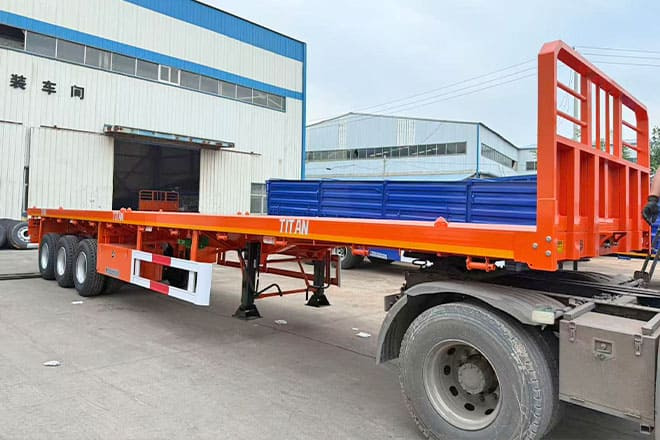 TITAN 40Ft Flatbed Trailer for Sale Price in Jamaica - Plato poluprikolica: slika 1 TITAN 40Ft Flatbed Trailer for Sale Price in Jamaica - Plato poluprikolica: slika 1