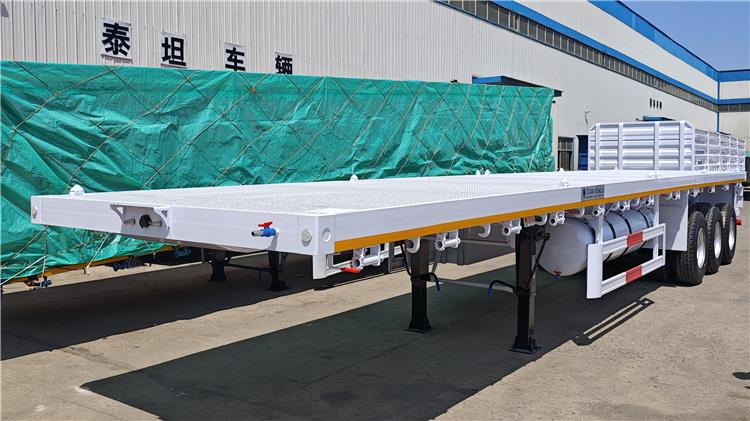 TITAN 40ft Tri Axle Flatbed Semi Trailer for Sale Price In Nigeria Lagos - Poluprikolica za prevoz kontejnera/ Poluprikolica sa promenjivim sandukom: slika 2 TITAN 40ft Tri Axle Flatbed Semi Trailer for Sale Price In Nigeria Lagos - Poluprikolica za prevoz kontejnera/ Poluprikolica sa promenjivim sandukom: slika 2