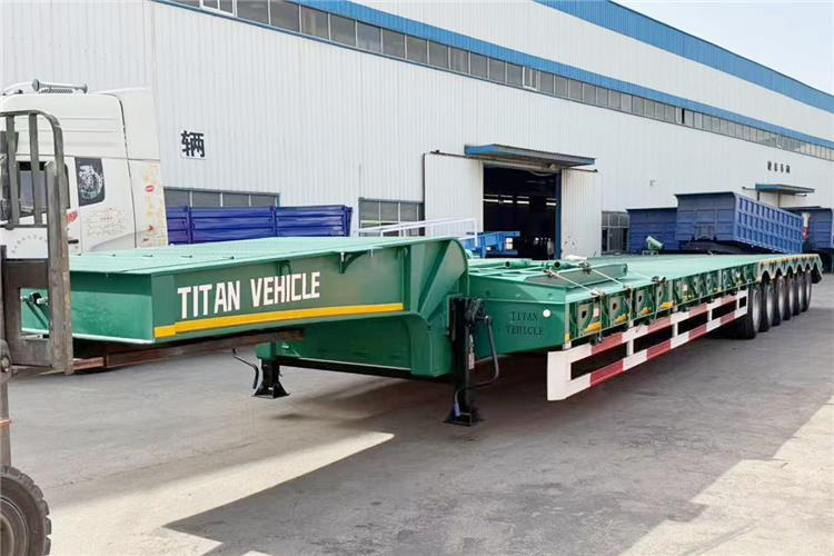 TITAN 6 Axle 80 Ton Low Loader Semi Trailer for Sale In Zambia - Niska poluprikolica za prevoz: slika 1 TITAN 6 Axle 80 Ton Low Loader Semi Trailer for Sale In Zambia - Niska poluprikolica za prevoz: slika 1