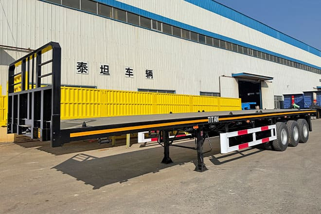 TITAN Tri Axle Flatbed Trailer for Sale in Jamaica - Plato poluprikolica: slika 1 TITAN Tri Axle Flatbed Trailer for Sale in Jamaica - Plato poluprikolica: slika 1