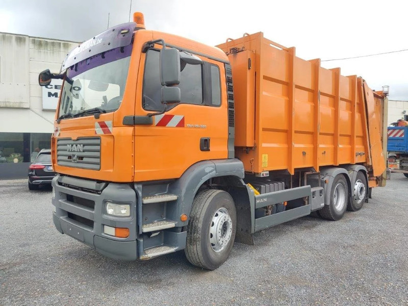 MAN TGA 26.320 6x2 garbage truck ZOELLER - Kamion za smeće: slika 1 MAN TGA 26.320 6x2 garbage truck ZOELLER - Kamion za smeće: slika 1