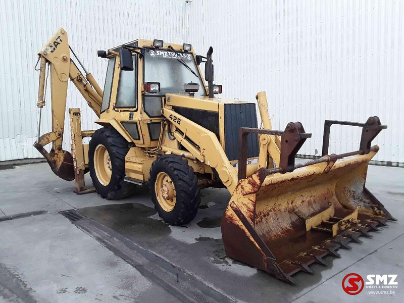 Caterpillar 428 - Bager utovarivač: slika 1 Caterpillar 428 - Bager utovarivač: slika 1
