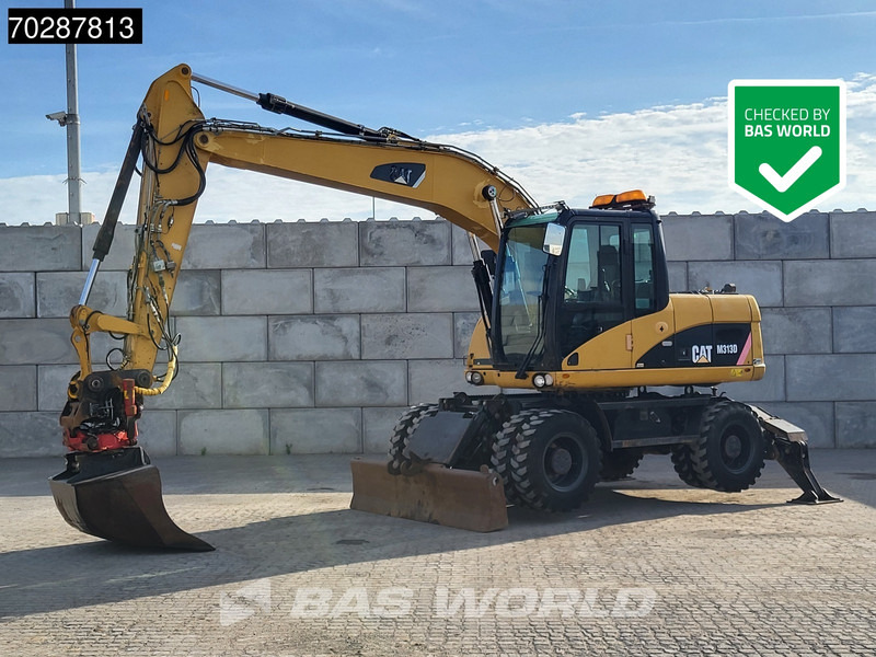 Caterpillar M313 D OUTRIGGERS + BLADE - Bager točkaš: slika 1 Caterpillar M313 D OUTRIGGERS + BLADE - Bager točkaš: slika 1