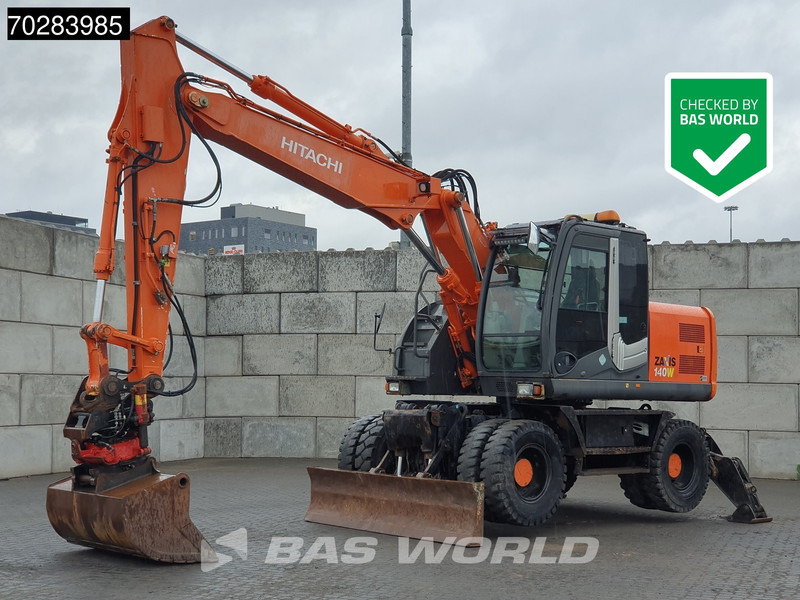 Hitachi ZX140W -3 OUTRIGGERS - ROTOTILT - Bager točkaš: slika 1 Hitachi ZX140W -3 OUTRIGGERS - ROTOTILT - Bager točkaš: slika 1