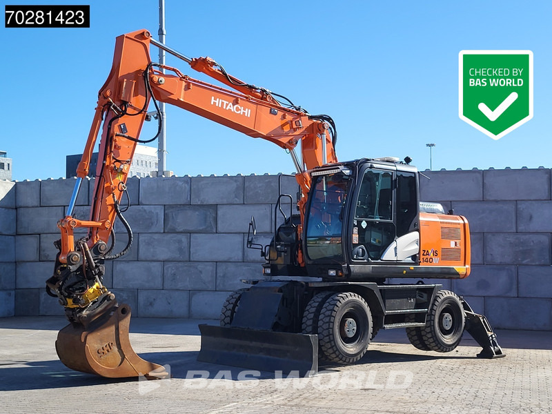 Hitachi ZX140W -5 OUTRIGGERS + BLADE - Bager točkaš: slika 1 Hitachi ZX140W -5 OUTRIGGERS + BLADE - Bager točkaš: slika 1