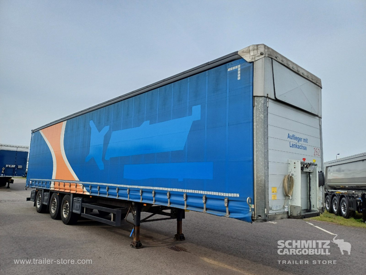 SCHMITZ Auflieger Curtainsider Standard Forklift holder - Poluprikolica sa ceradom: slika 1 SCHMITZ Auflieger Curtainsider Standard Forklift holder - Poluprikolica sa ceradom: slika 1