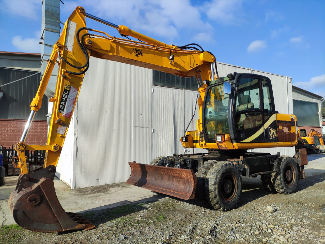 JCB JS145W - Bager točkaš: slika 1 JCB JS145W - Bager točkaš: slika 1