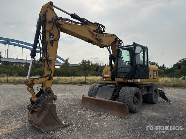 2012 Cat M313D Pelle Sur Pneus Wheel Excavator - Bager točkaš: slika 1 2012 Cat M313D Pelle Sur Pneus Wheel Excavator - Bager točkaš: slika 1