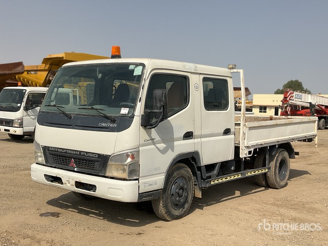 2010 Mitsubishi Canter 4x2 Crew Cab Flatbed Truck - Kamion sa tovarnim sandukom: slika 1 2010 Mitsubishi Canter 4x2 Crew Cab Flatbed Truck - Kamion sa tovarnim sandukom: slika 1