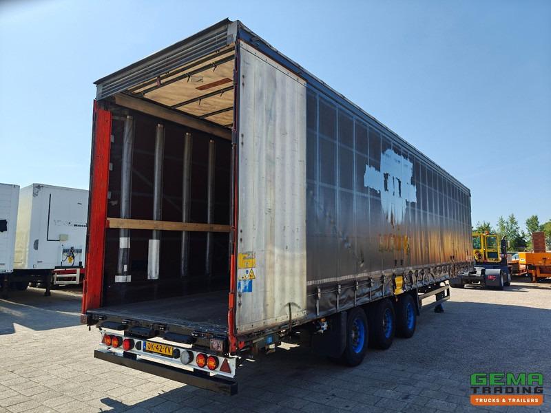 Schmitz Cargobull SCS 24/L - 13.62 MB VARIOS (S01) 3-Assen SAF - MEGA - Schuifzeilen/Hef/SchuifDak - Gegalvaniseerd - Schijfremmen - Poluprikolica sa ceradom: slika 2 Schmitz Cargobull SCS 24/L - 13.62 MB VARIOS (S01) 3-Assen SAF - MEGA - Schuifzeilen/Hef/SchuifDak - Gegalvaniseerd - Schijfremmen - Poluprikolica sa ceradom: slika 2