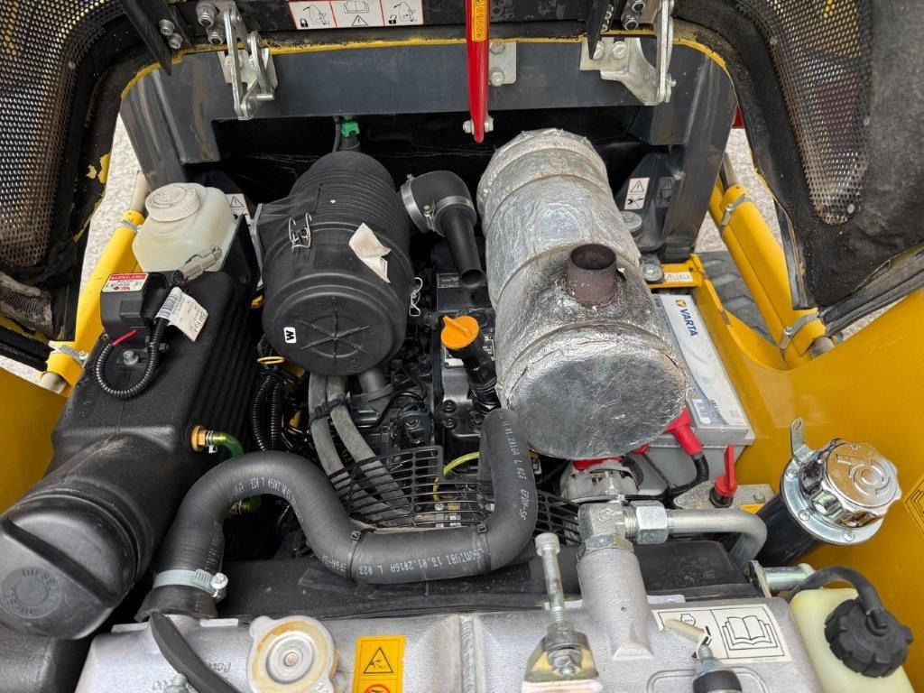 Mini utovarivač Komatsu SK714-5 (4026): slika 9