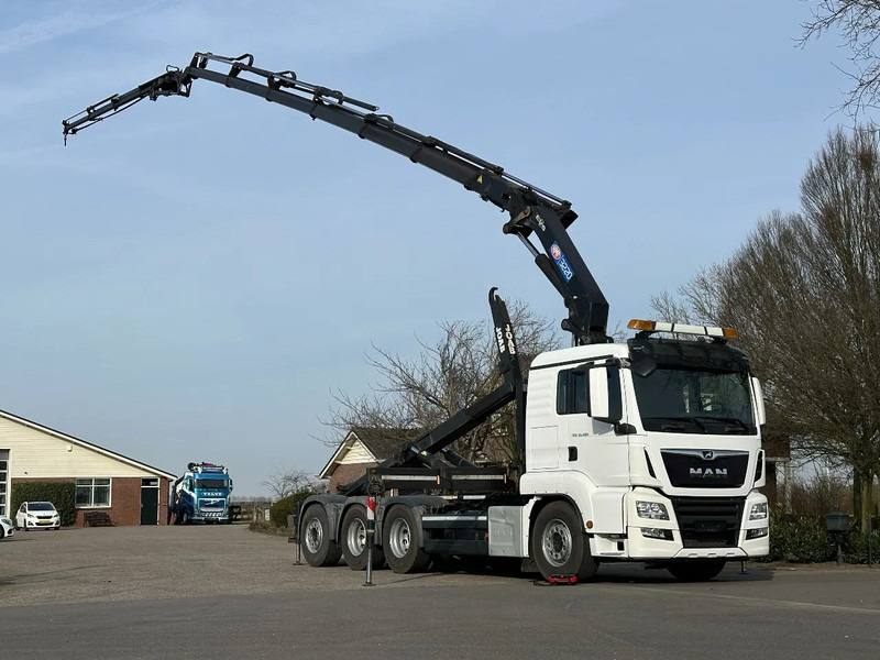 MAN TGS 35.500 8x4!!TRIPLE!!HMF 32TM/FLYJIB/HOOKLIFT!!EURO6!! ROOF/DACH/CONSTRUCTION!!203tkm!! TOP!! - Kamion sa hidrauličnom kukom, Kamion sa dizalicom: slika 1 MAN TGS 35.500 8x4!!TRIPLE!!HMF 32TM/FLYJIB/HOOKLIFT!!EURO6!! ROOF/DACH/CONSTRUCTION!!203tkm!! TOP!! - Kamion sa hidrauličnom kukom, Kamion sa dizalicom: slika 1
