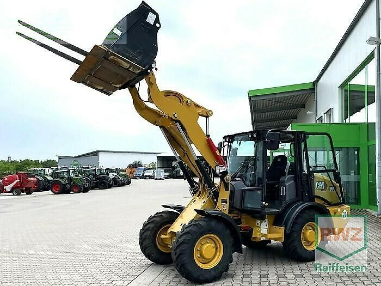 Caterpillar 906 radlader - Mini bager: slika 1 Caterpillar 906 radlader - Mini bager: slika 1