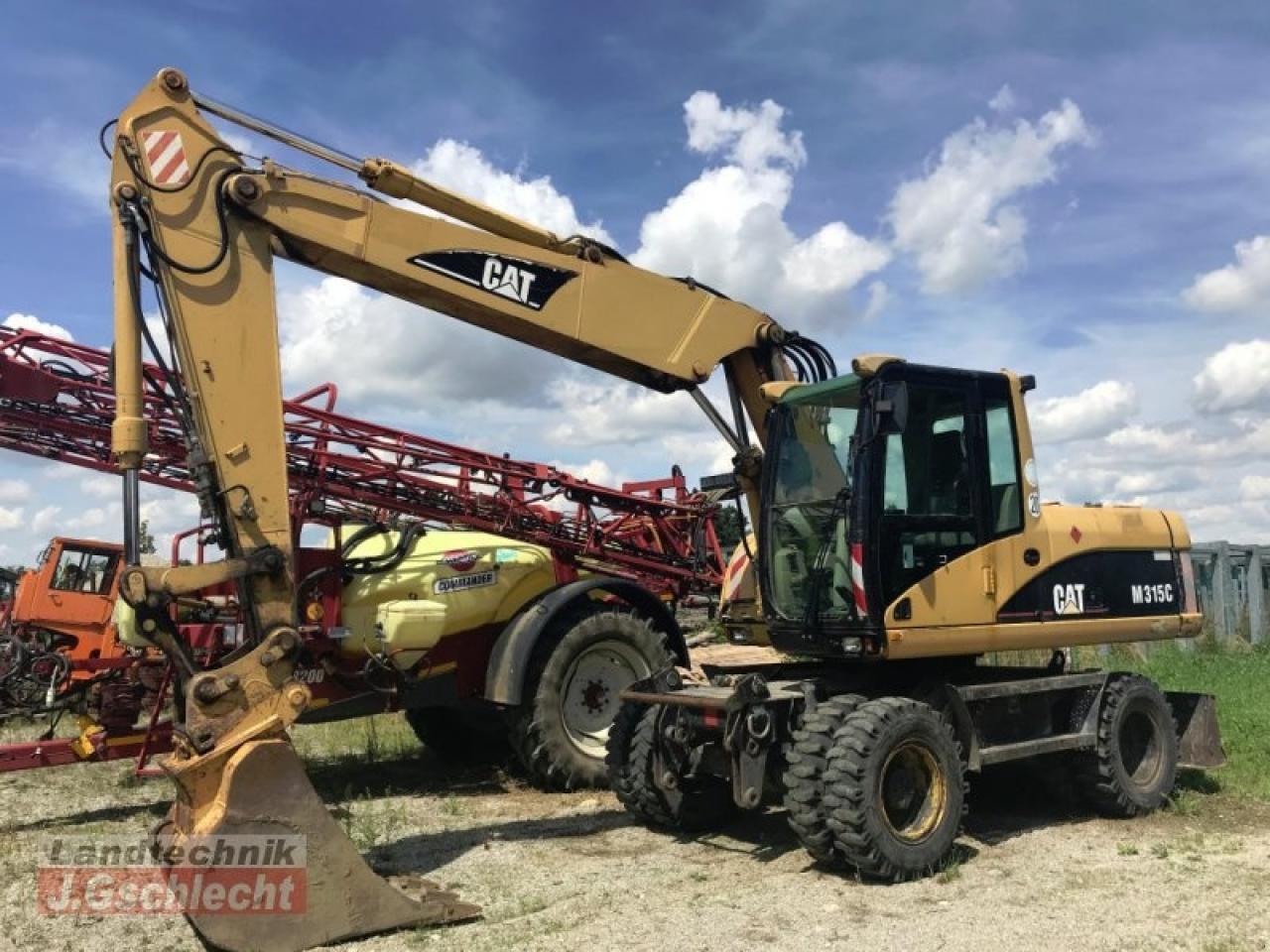 Caterpillar m 315c - Bager točkaš: slika 1 Caterpillar m 315c - Bager točkaš: slika 1