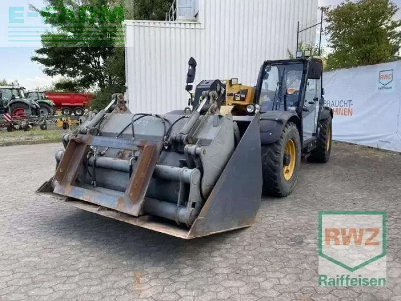 Caterpillar th 407c kompaktlad - Mini bager: slika 4 Caterpillar th 407c kompaktlad - Mini bager: slika 4