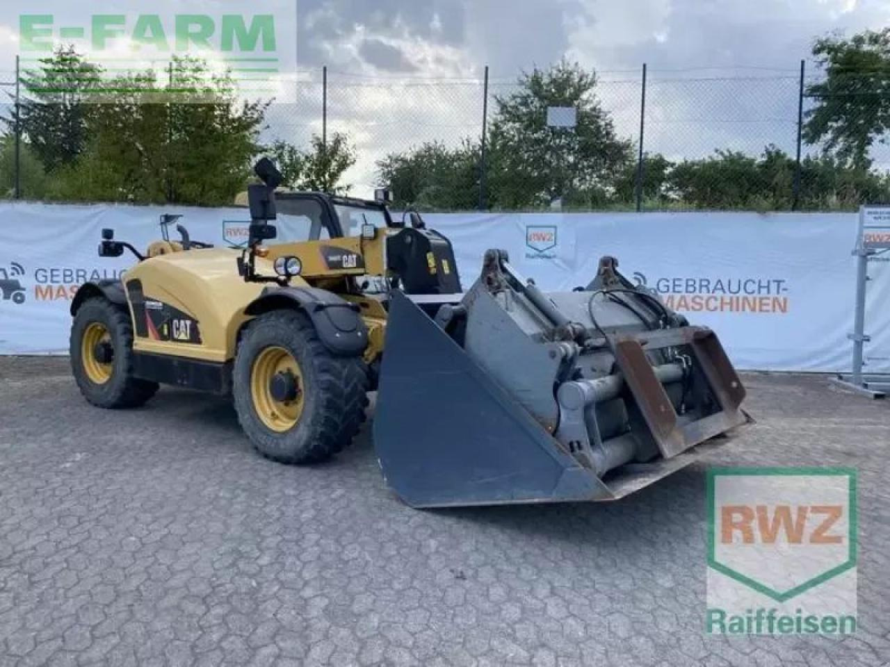 Caterpillar th 407c kompaktlad - Mini bager: slika 1 Caterpillar th 407c kompaktlad - Mini bager: slika 1