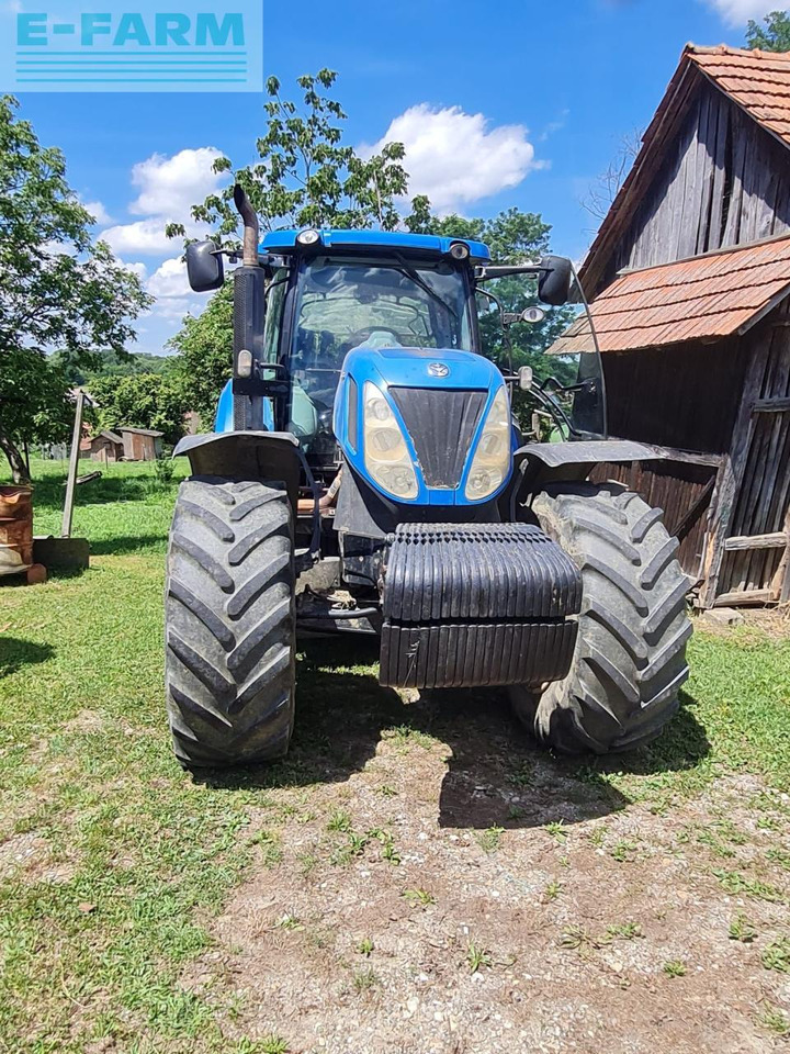 New Holland T7050 - Traktor: slika 1 New Holland T7050 - Traktor: slika 1
