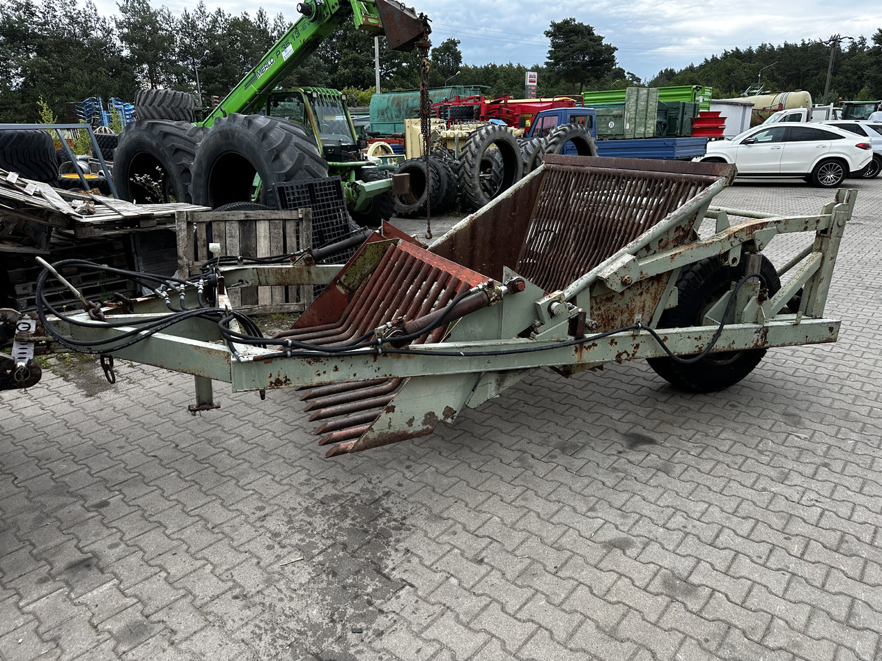 Zbieracz kamieni Fortschritt Steinsammler Steinsammelwagen - Oprema za obradu zemljišta: slika 1 Zbieracz kamieni Fortschritt Steinsammler Steinsammelwagen - Oprema za obradu zemljišta: slika 1