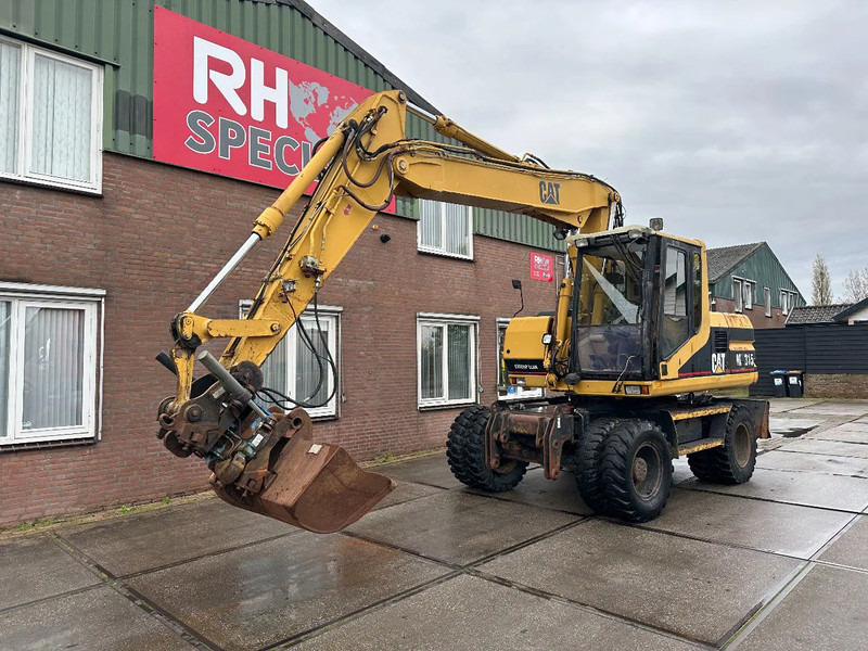 Caterpillar M315 +ROTO CE - Bager točkaš: slika 2 Caterpillar M315 +ROTO CE - Bager točkaš: slika 2