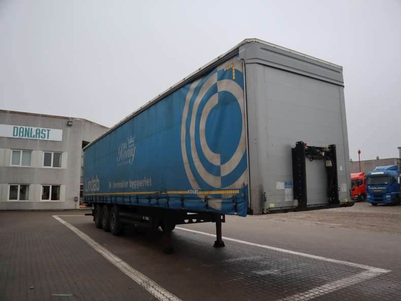 Kögel Curtainsider/Planenauflieger/Gardin - Poluprikolica sa ceradom: slika 2 Kögel Curtainsider/Planenauflieger/Gardin - Poluprikolica sa ceradom: slika 2