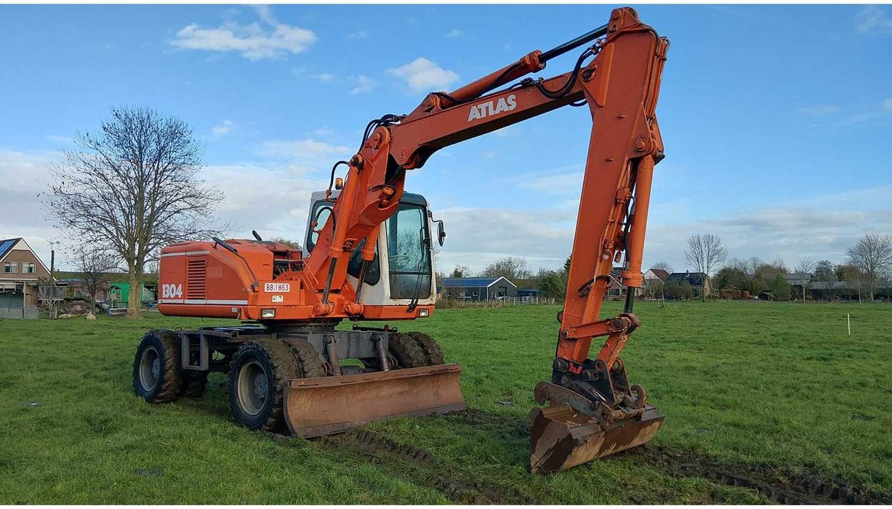 1994 ATLAS 1304 WHEELED EXCAVATOR - Bager točkaš: slika 2 1994 ATLAS 1304 WHEELED EXCAVATOR - Bager točkaš: slika 2