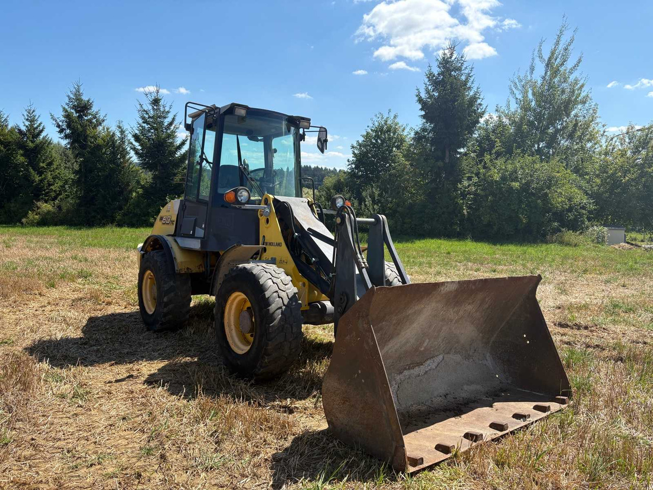 New Holland W80TC - Utovarivač točkaš: slika 4 New Holland W80TC - Utovarivač točkaš: slika 4