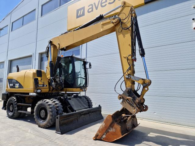 CATERPILLAR M315 - Bager točkaš: slika 5 CATERPILLAR M315 - Bager točkaš: slika 5