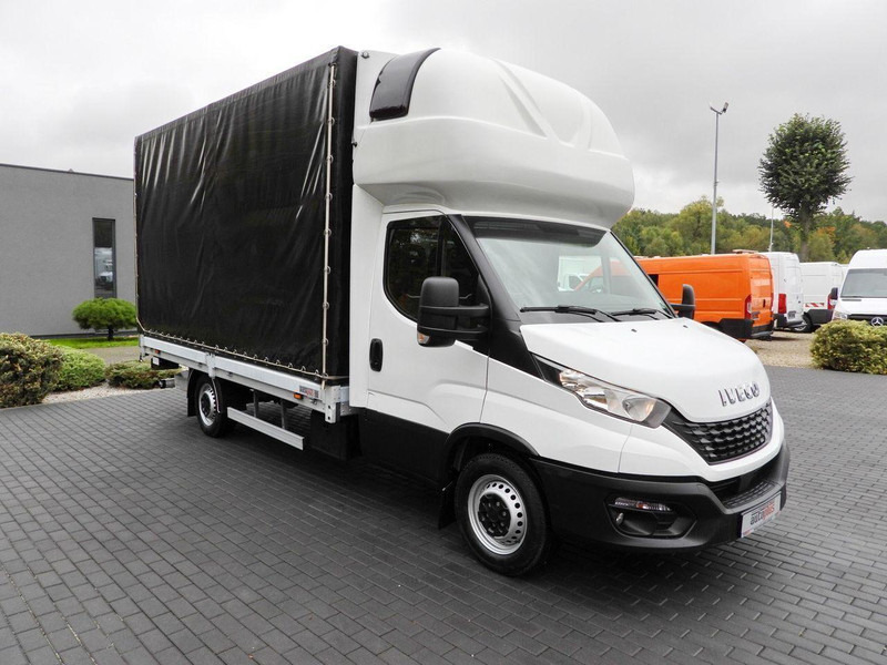 Iveco DAILY 35S18 PLANDEKA WINDA 8 PALET WEBASTO TEMPOMAT KLIMATYZACJA - Dostavno vozilo sa ceradom: slika 4 Iveco DAILY 35S18 PLANDEKA WINDA 8 PALET WEBASTO TEMPOMAT KLIMATYZACJA - Dostavno vozilo sa ceradom: slika 4