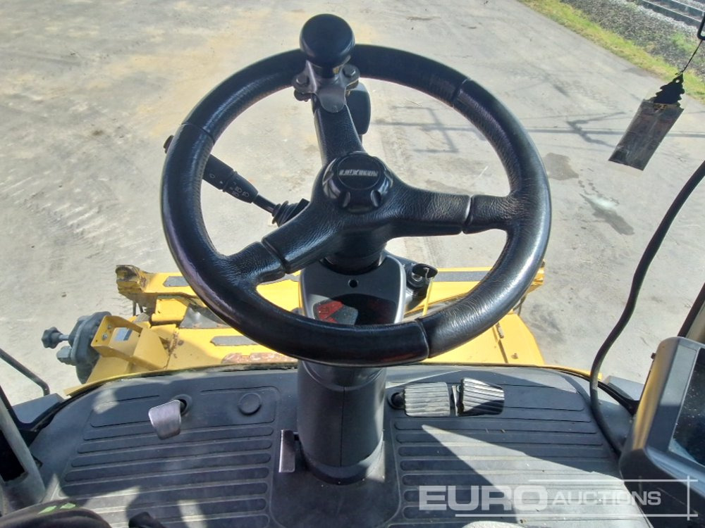 Kombinovani kombajn CAT LEXION 570R: slika 39