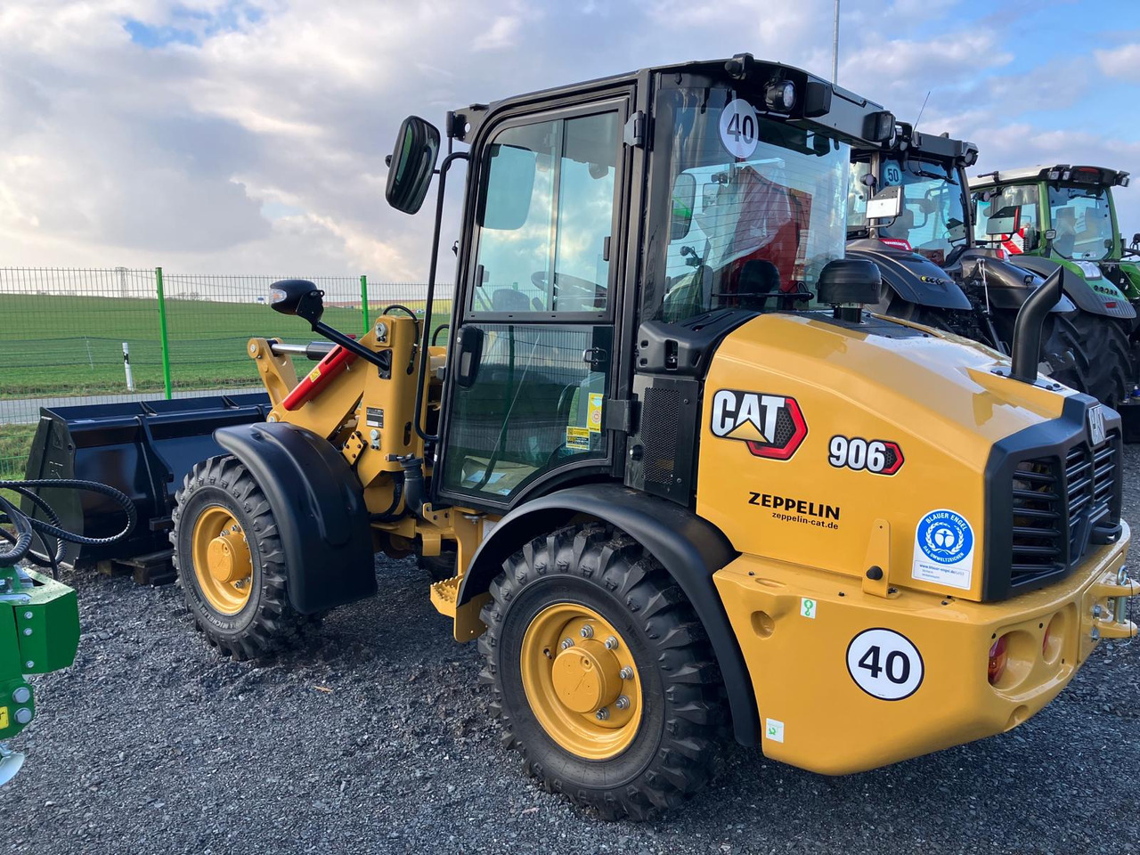 Caterpillar 906 - Utovarivač točkaš: slika 2 Caterpillar 906 - Utovarivač točkaš: slika 2