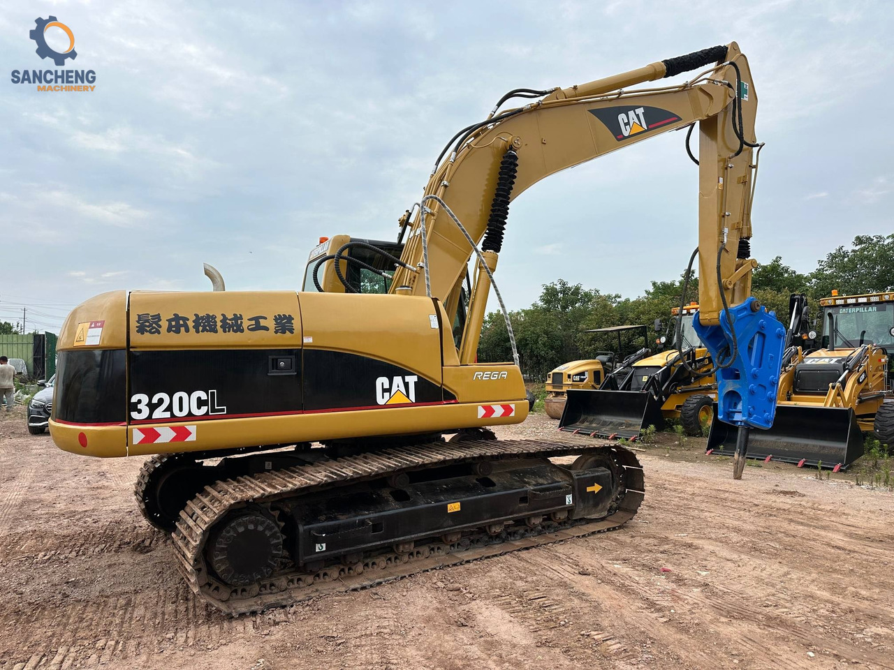 CAT 320CL with hammer - Bager guseničar: slika 1 CAT 320CL with hammer - Bager guseničar: slika 1