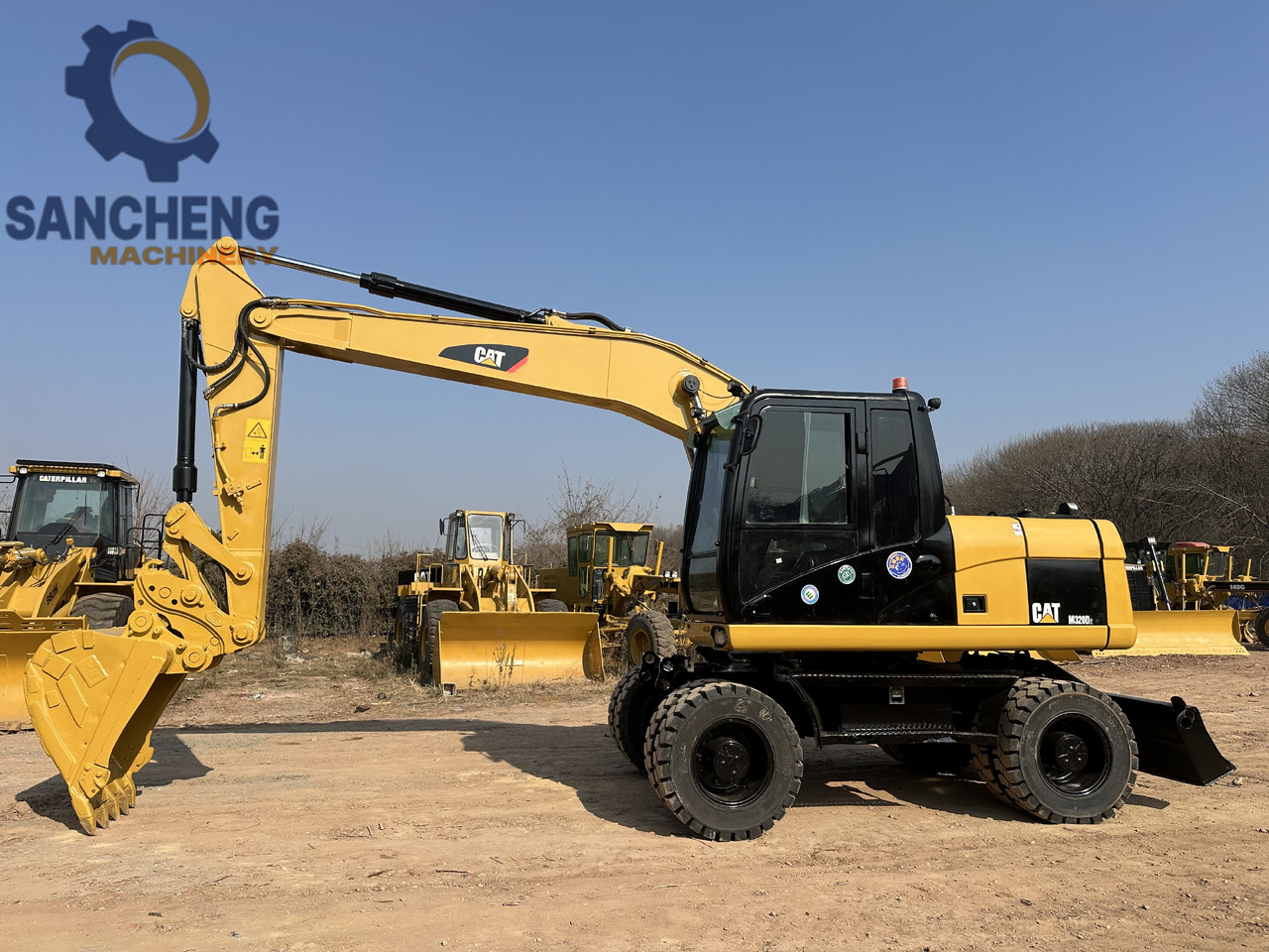 CATERPILLAR M320D2 - Bager točkaš: slika 5 CATERPILLAR M320D2 - Bager točkaš: slika 5