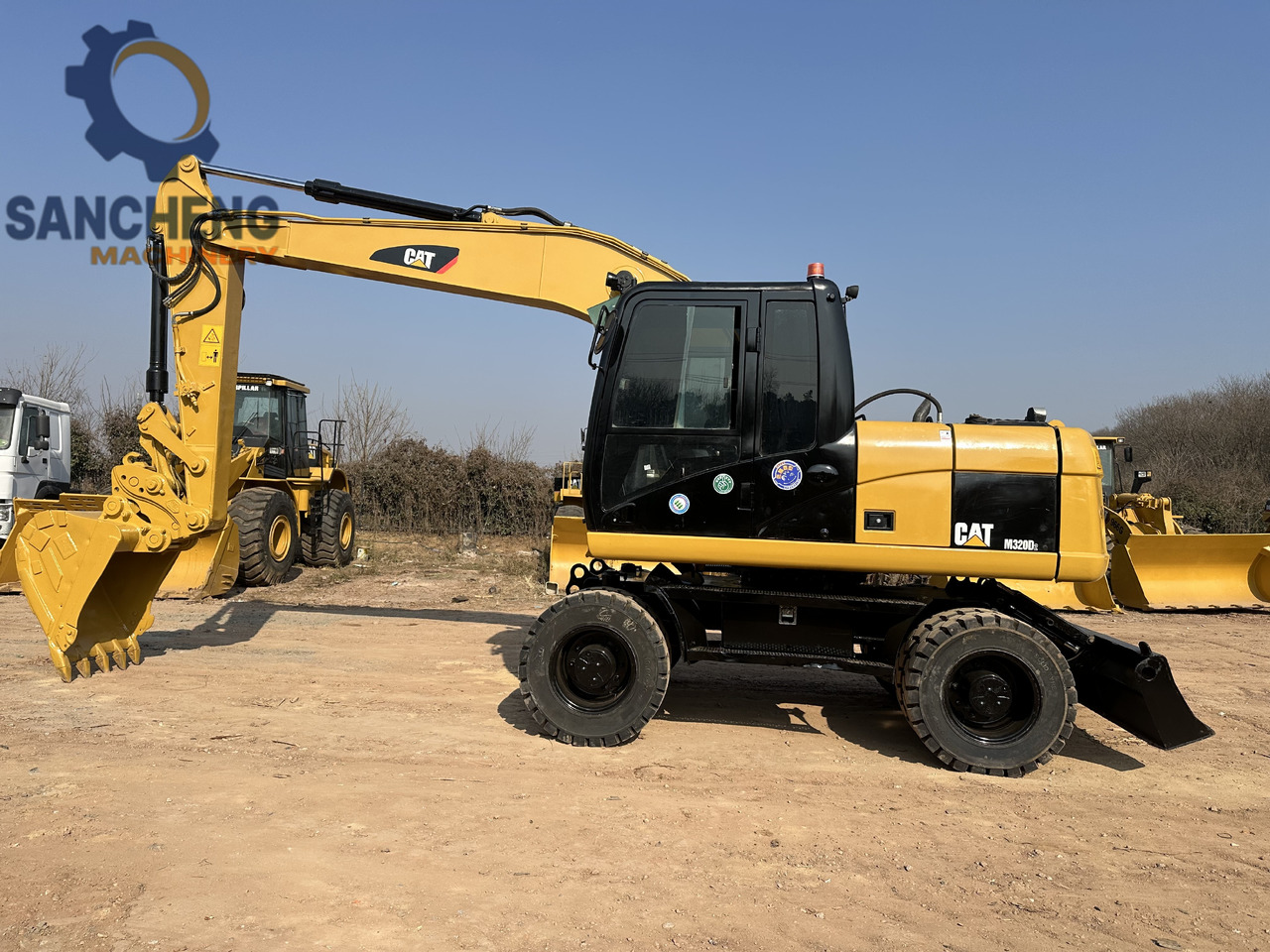 CATERPILLAR M320D2 - Bager točkaš: slika 2 CATERPILLAR M320D2 - Bager točkaš: slika 2